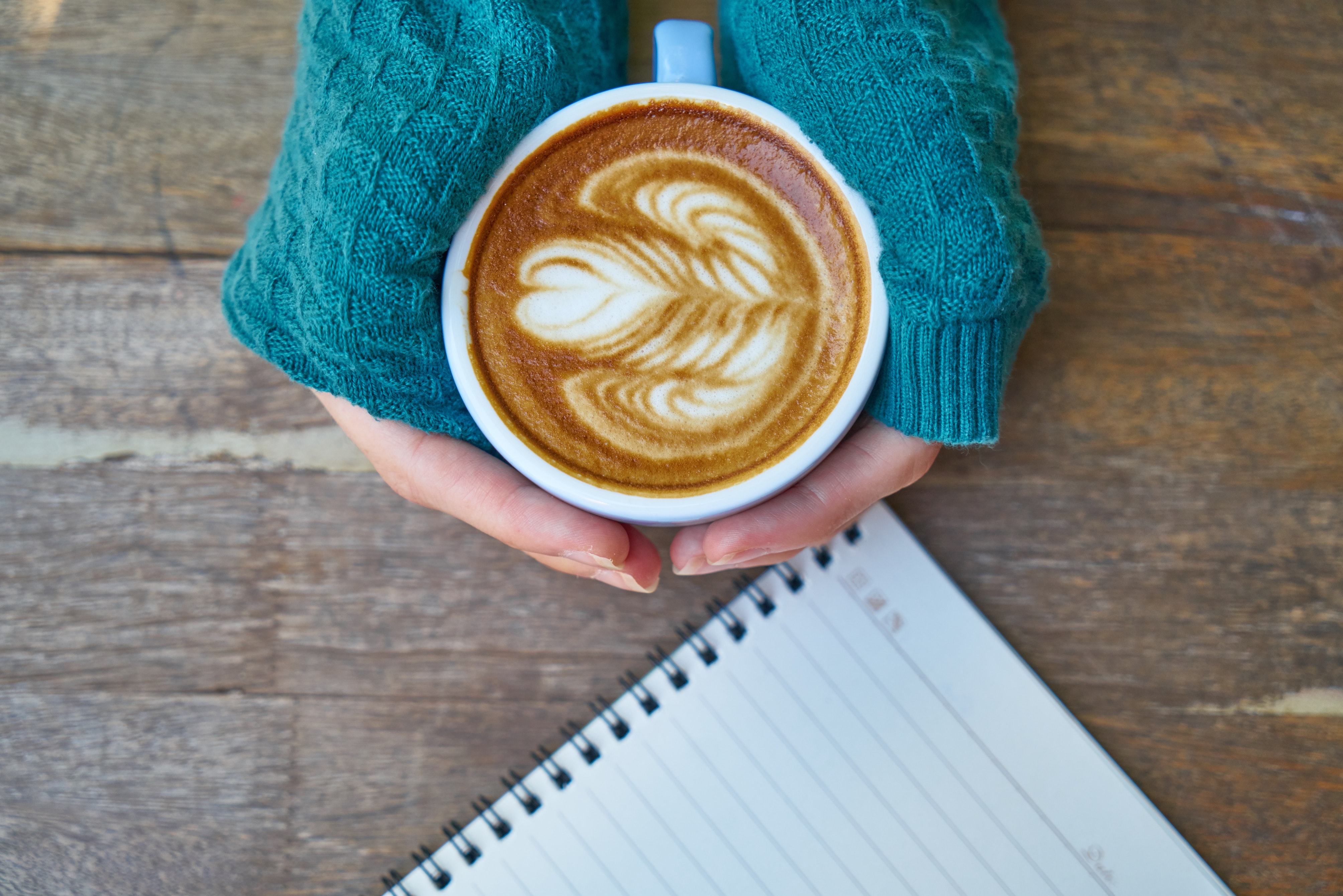 woman holding coffee